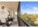 Spacious screened-in balcony with seating offers a relaxing outdoor living space at 25188 Marion Ave # E208, Punta Gorda, FL 33950
