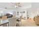 Bright dining room featuring a large table, an organ, recessed lighting, and views of other rooms at 25188 Marion Ave # E208, Punta Gorda, FL 33950