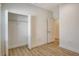 Bright bedroom featuring tile floors and a closet, providing ample storage space at 309 Potenza Loop, Nokomis, FL 34275