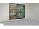 Screened lanai providing a seamless transition to outdoor living with a view of the kitchen at 309 Potenza Loop, Nokomis, FL 34275