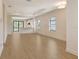 Open floor plan shows kitchen, living room and access to the back yard at 309 Potenza Loop, Nokomis, FL 34275