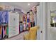 Spacious walk-in closet with custom shelving and storage at 3301 River Woods Dr, Parrish, FL 34219