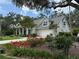 Charming single-Gathering home featuring a well-manicured lawn and a two-car garage at 3301 River Woods Dr, Parrish, FL 34219