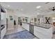 Open-concept kitchen boasts modern appliances, a spacious island, and seamless access to living areas at 3301 River Woods Dr, Parrish, FL 34219