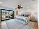 Light and airy bedroom with calming decor and beautiful views of the water at 355 W Royal Flamingo Dr, Sarasota, FL 34236