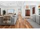 Open-concept living area with wood floors, recessed lighting, and a seamless flow at 355 W Royal Flamingo Dr, Sarasota, FL 34236