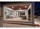 Inviting outdoor patio with dining and lounge areas, showcasing a blend of indoor/outdoor living at 355 W Royal Flamingo Dr, Sarasota, FL 34236