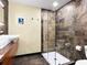 Elegant bathroom with a glass-enclosed shower, updated fixtures, and sophisticated tile work at 355 W Royal Flamingo Dr, Sarasota, FL 34236