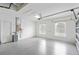 Clean, bright garage with epoxy floor, windows, and ample storage space at 4245 Corso Venetia Blvd, Venice, FL 34293