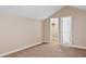 Spacious bedroom with neutral carpet and ensuite bathroom at 4931 Hidden Oaks Trl, Sarasota, FL 34232
