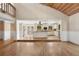 Spacious kitchen with stainless steel appliances, a center island, and an open layout at 4931 Hidden Oaks Trl, Sarasota, FL 34232