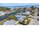 Aerial view of waterfront property showcasing the home's desirable location on a canal with boat access at 504 Bayview Dr, Holmes Beach, FL 34217