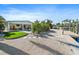 Spacious backyard featuring an outdoor patio, lush greenery, and easy access to the waterfront at 504 Bayview Dr, Holmes Beach, FL 34217