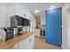 Convenient bar area with a beverage cooler, attractive countertop, and decorative accents, enhancing everyday living at 504 Bayview Dr, Holmes Beach, FL 34217