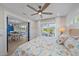 Inviting bedroom with calming decor, natural light, and a view to the dining area, creating a peaceful sanctuary at 504 Bayview Dr, Holmes Beach, FL 34217