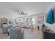 Inviting living room featuring a large window, comfortable seating, and stylish decor at 504 Bayview Dr, Holmes Beach, FL 34217