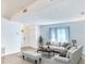 Bright living room featuring neutral furniture, light wood floors and bright natural light at 5642 Garden Lakes Dr, Bradenton, FL 34203
