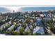 Coastal home surrounded by lush tropical foliage with convenient parking, near the beach, and local amenities at 5807 De Palmas Ave, Holmes Beach, FL 34217