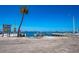 Picturesque view of the boat ramp with clear blue sky with easy access to the serene waters for boating enthusiasts at 5807 De Palmas Ave, Holmes Beach, FL 34217