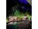 Outdoor entertaining area featuring a pool, string lights, and patio furniture for outdoor living at 5807 De Palmas Ave, Holmes Beach, FL 34217