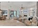 Spacious living room with seamless flow to the outdoors, creating a bright and airy space at 6612 Saint James Xing, University Park, FL 34201