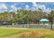 Well maintained tennis courts with covered seating offer a great outdoor recreational opportunity at 6612 Saint James Xing, University Park, FL 34201