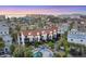 An aerial shot presents the community pool and meticulously maintained landscaping of the townhome complex at 6790 Sarasea Cir # 6790, Sarasota, FL 34242