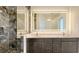 Luxurious bathroom featuring dual vanity, sleek lighting and a shower with designer tile at 1210 Gulf Blvd, Englewood, FL 34223