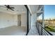 This bedroom includes large glass doors that lead to the spacious outdoor balcony at 1210 Gulf Blvd, Englewood, FL 34223