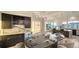 Elegant dining room with seating for six and a bar area, complemented by ocean views at 1210 Gulf Blvd, Englewood, FL 34223