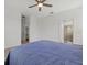 Spacious main bedroom with walk-in closet and access to ensuite bathroom at 2081 Gardenia Ave, Port Charlotte, FL 33953