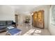 Inviting living room with stylish decor, tiled floors, and comfortable seating arrangement perfect for relaxation at 2377 Burton Ln, Sarasota, FL 34239