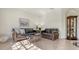 Comfortable living room featuring elegant furnishings, tiled floors, and a bright, welcoming atmosphere at 2377 Burton Ln, Sarasota, FL 34239