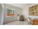 Bright office featuring neutral tones, tile flooring, and a large window offering ample natural light at 2377 Burton Ln, Sarasota, FL 34239
