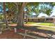 The Arlington Park and Recreation Facility with picnic tables surrounded by trees at 2377 Burton Ln, Sarasota, FL 34239