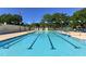 A sparkling pool at Arlington Park is ready for swimmers with clearly marked lanes at 2377 Burton Ln, Sarasota, FL 34239