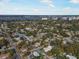 Scenic aerial view of a coastal neighborhood with mature trees and city views at 2524 11Th W Ave, Bradenton, FL 34205