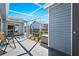Enclosed patio with a screened-in enclosure, outdoor furniture, and views of the surrounding community at 3300 Loveland Blvd # 3203, Punta Gorda, FL 33980