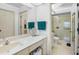 Well-lit bathroom with a clean design, vanity, and glass-enclosed shower at 3370 E Chelmsford Ct # 49, Sarasota, FL 34235