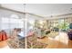 Inviting living room with comfortable seating, sliding glass doors, and stylish decor, perfect for relaxation at 3370 E Chelmsford Ct # 49, Sarasota, FL 34235