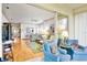Inviting living room with a hardwood floor, comfortable seating, and bright natural light at 3370 E Chelmsford Ct # 49, Sarasota, FL 34235