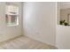 Bedroom with window, neutral carpet, and ample natural light at 3823 Parkridge Cir # 1-101, Sarasota, FL 34243