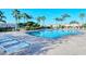 Relaxing community pool with plenty of seating for residents and guests at 3823 Parkridge Cir # 1-101, Sarasota, FL 34243