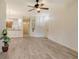 Bright and airy living space featuring light-colored floors, ceiling fan, and neutral wall paint at 3823 Parkridge Cir # 1-101, Sarasota, FL 34243