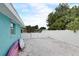 Backyard features a crushed shell foundation with a full fence for privacy; room for boat parking and other utility purposes at 408 Bryn Mawr Is, Bradenton, FL 34207