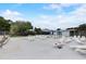 Community offers spacious pool area, with lounge chairs and a view of the clubhouse at 408 Bryn Mawr Is, Bradenton, FL 34207