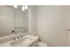 Half bathroom features a modern sink and vanity at 428 Bocelli Dr, North Venice, FL 34275