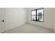 Bedroom has carpet and a window at 428 Bocelli Dr, North Venice, FL 34275