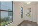 Inviting foyer with hardwood floors and sidelight windows providing lots of natural light at 428 Bocelli Dr, North Venice, FL 34275