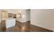 Bright kitchen with white cabinets, stainless steel appliances, and a center island at 428 Bocelli Dr, North Venice, FL 34275